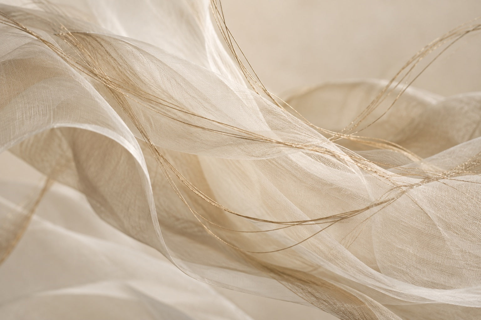 Abstract ivory textiles and gold threads representing connection and movement